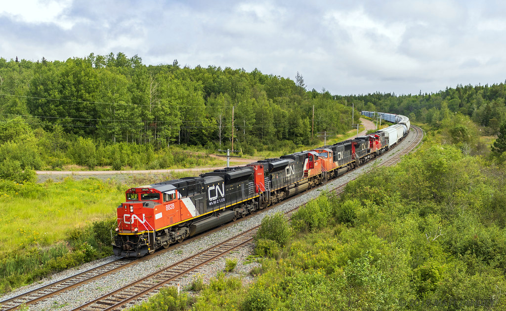 Train 407 rounds the bend at Springhill Jct, Nova Scotia.