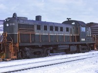 On a cold morning in Chetwynd BC, engine 566 is trailing in the consist, most likely just arrived from a Taylor or Fort St John turn. 566 is not showing any railway logo and most likely the PGE logo has been painted over and the British Columbia Railway dogwood emblem has not been applied. The new logo will be made of a stick on type of durable vinyl material.