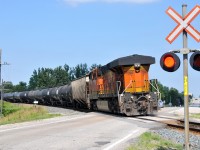 BNSF 7090 brings up the rear of 650 as the tail end DPU. KCS 4803 - CP 8606 were leading the 102 car train through Drumbo on this hot July afternoon 