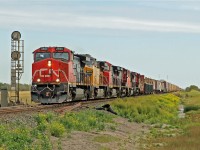 A mixed array of power on this eastbound entering the siding at Russett.  Dash 9-44CW CN 2590 is in the lead followed by AC4400CW UP 6611, Dash 9-44CW CN 2573, Dash 8-40CW CN 2099, SD75I CN 5676 and in the rear Dash 8-40CW CN 2166.
 