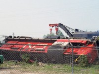 CN RS18 3151, one of the six RS18 units CN rebuilt for the new Tempo train corridor service that started just a few months before in June 1968, sits on its side after derailing on Sarnia to Toronto Tempo train #150 one mile east of Oakville. CN crane 50109 in the background is on the wreck train, working cleanup duty at the site.
<br><br>
For an overview photo of the derailment, see: <a href=http://www.railpictures.ca/?attachment_id=38626><b>http://www.railpictures.ca/?attachment_id=38626</b></a>