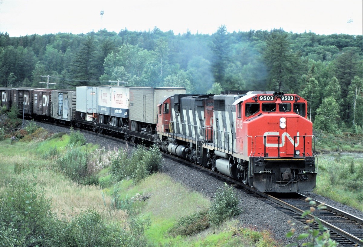 CN train 214 heads east out of Capreol, Ontario on the now abandoned Alderdale Subdivision.  This train had the 9503 and 2026 for power and consisted of 74 loads and 6 empties.  Other statistics are 6019 feet long and 6284 tons.  Location shown is approximate.