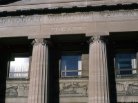 A closer look at some of the lettering and images over the main entrance of <a href=http://www.railpictures.ca/?attachment_id=38517><b>CN's Hamilton (James Street) Station</b></a>, including carved murals in the stone of CN steam engines and railway equipment in various industrial, prairie and port scenes. MCMXXX is 1930 in Roman numerals.