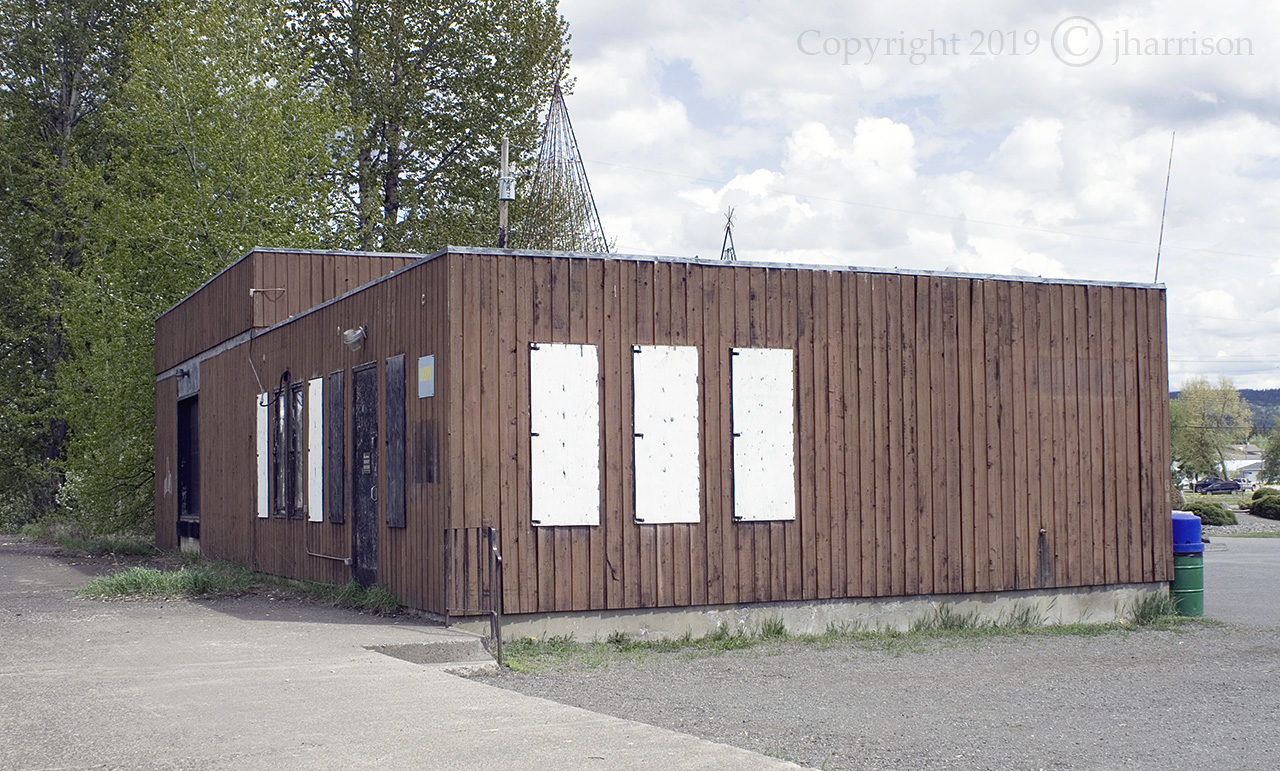 Local history has it that the first railway station in Houston B.C. burned down. The second station was built in 1925, eventually torn down, and replaced with the station seen here in 1971. Obviously designed more for function than good looks, I'm sure it must have served it's purpose well at the time. Note the old Christmas decorations on the roof, the faded VIA sign, and the 1970's style safety railing.