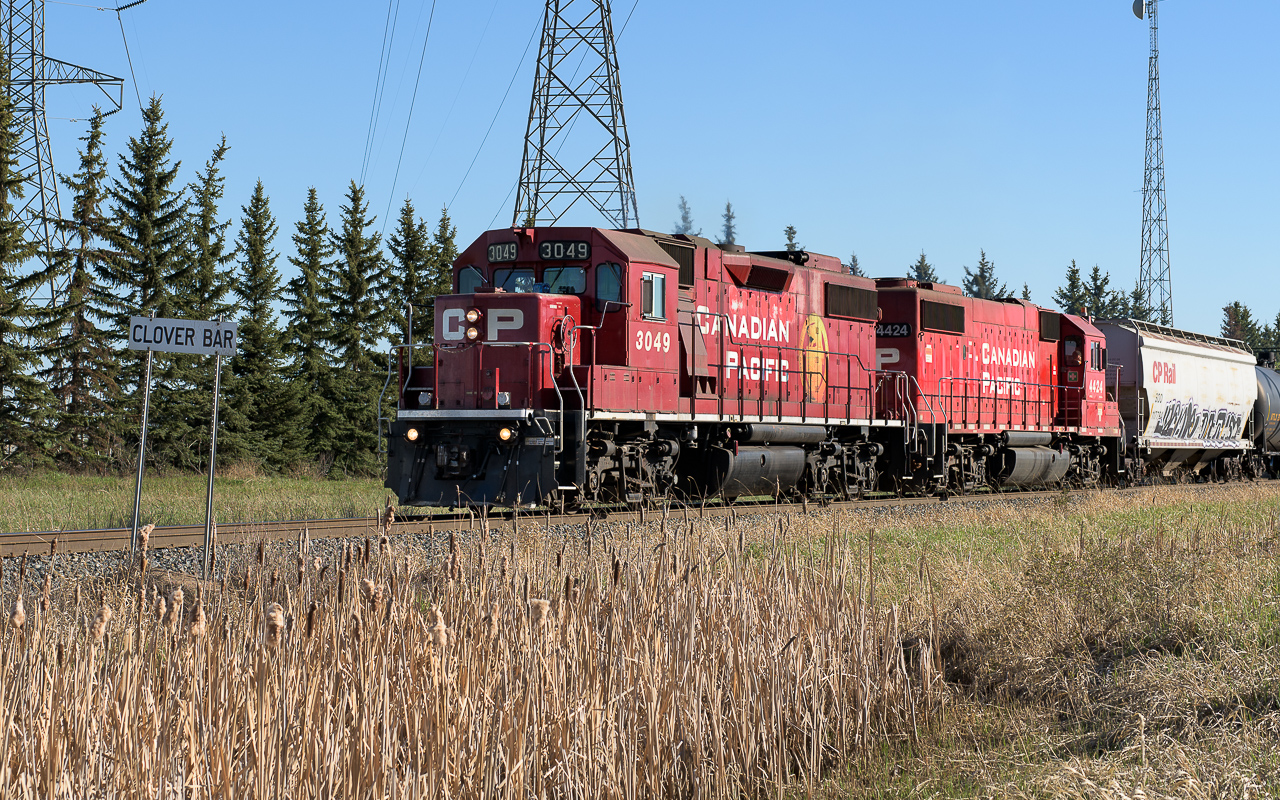 Wearing only its second paint scheme, the 3049 does not have the fresh look anymore like the 2007 photos I just perused of it on the CPR diesel roster website. Ex SOO 4424 is trailing. They are heading out with cars for customers west of Clover Bar yard.