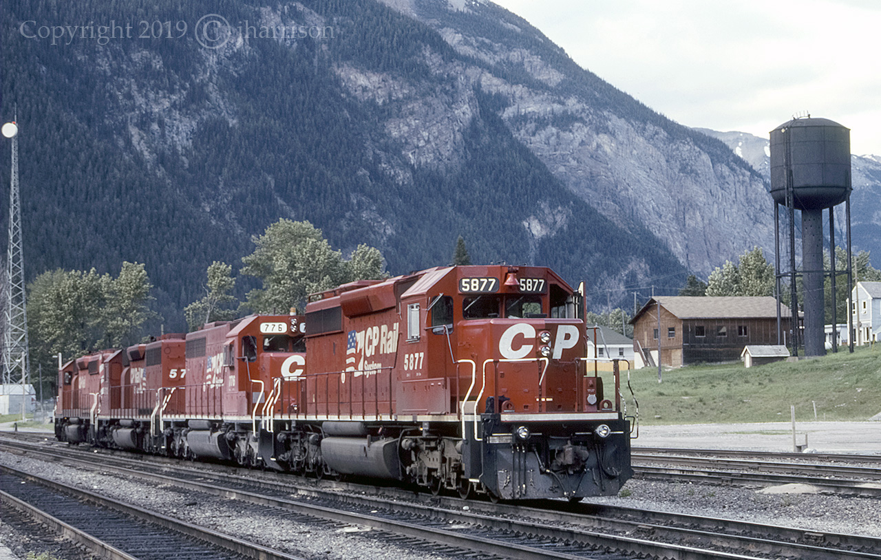 The CP 5877 / CP SOO 776 / CP 5712 and 5976 at Field, on CP's Mountain Sub.