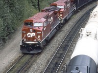 CP 9528 with the 9517 trailing are westbound at White, now known as Woodman, and less than a Km from Revelstoke, on CP's Mountain Sub. The RCU with this train was CP 9536. GPS is approximate.