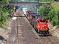 The last regularly scheduled CN trains through the tunnel in Windsor were about a decade ago, having never photographed one here I didn't think I'd actually get the opportunity to do so again. That changed when the derailment occurred in Sarnia on June 28th, and I took advantage of every opportunity I could to catch those re-routes. Cutting the lawn? Groceries? Nah, those can wait, rare trains are far more important. Here we see CN 326 lead by 5484, 2541 and 8933 as they climb out of the tube on their way to home rails at Little Yard, and eventually London.