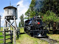 Fort Steele's MLW 2-6-2 # 1077 approaches the station on completion of it's 4 km round trip journey to the observation deck overlooking the confluence of the St. Mary and Kootenay Rivers. Built in 1923 as a wood burner for use in forestry service it was later converted to oil burning to eliminate the risk of hot sparks from the stack. After retiring from active service it was rebuilt and came to Fort Steele in 1989 where it has been the faithful workhorse since.