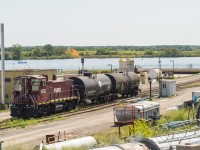 FURX 1552 is seen sitting within the CASCO facility at Cardinal Ontario.  This was the only visible locomotive at the plant when we drove by on our way to Quebec City.