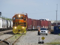 QGRY 2004 is preparing to leave Quebec Gatineau's Ste-Thérèse Yard with 45 cars.