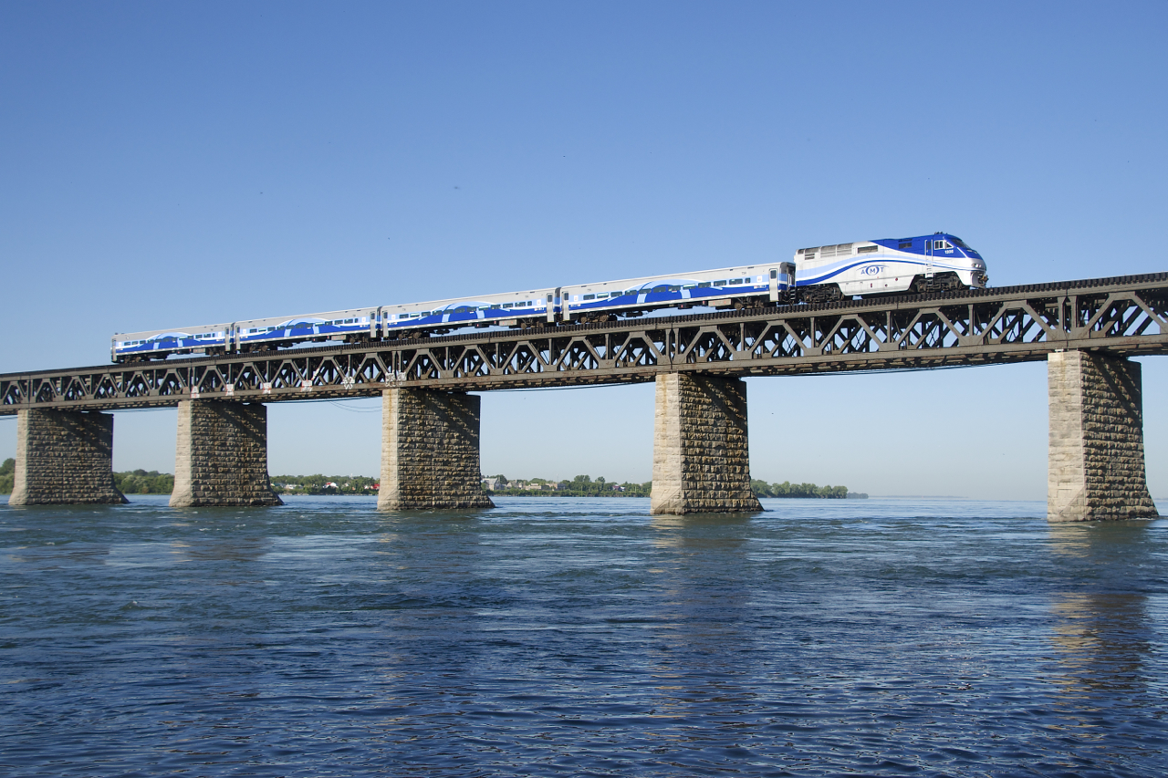 AMT 1326 leads EXO 80 as it approaches the island of Montreal towards the end of the morning rush hour.