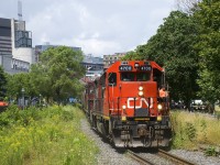 CN 4700 & CN 4129 are leaving the Port of Montreal with 9 cars in tow.