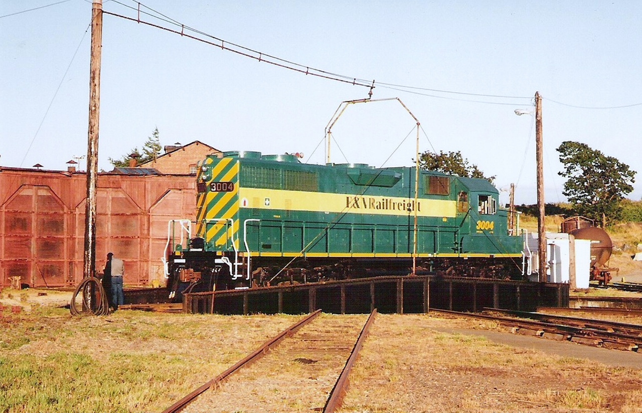 During the heyday of the "E&N RAILFREIGHT" operations on Vancouver Island I was lucky enough to be in the right place and at the right time to catch the #3004 being turned on the Victoria turntable. Normally the turntable would sit lined up with stall #1 for the VIA Rail cars to use.