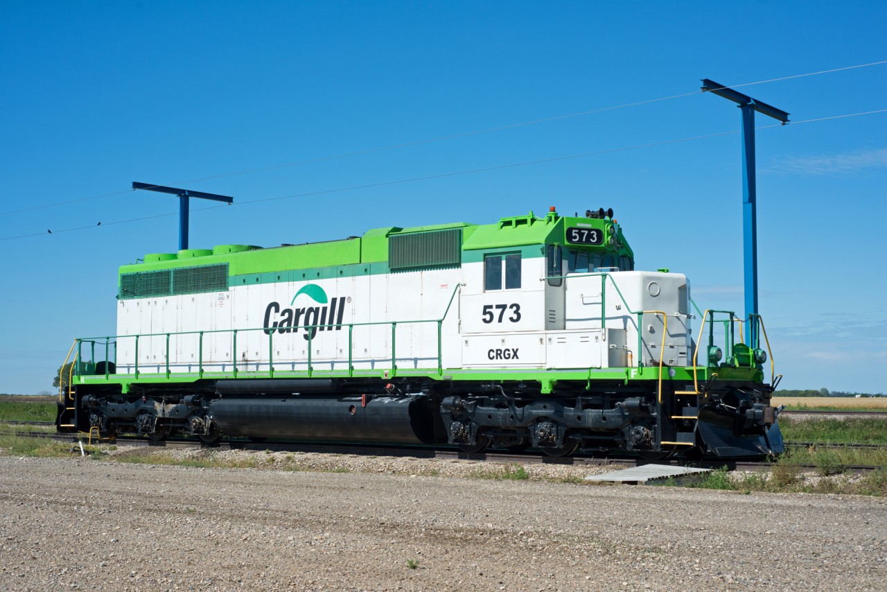 This ex L&N SD40, now a de-turbocharged SD38-3 soaks up the sun just east of Elva Manitoba.