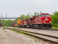 CP 254, powered by 8045 and 8710 with SD40-2s 6020 and 6005 DIT, has just departed Welland for Buffalo, heading under the defunct signal bridge at Feeder. In the background, CN L562 with the 5615 solo continues to work Trillium's Feeder Yard, after bringing over <a href="http://www.railpictures.ca/?attachment_id=37795" target="_blank">a larger transfer in excess of 50 cars</a>.