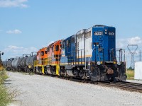 I had the week of July 22 off work, and spent it hanging around back home in Norfolk. In addition to going to the beach every day, I got in a fair bit of railfanning with <a href="http://www.railpictures.ca/?attachment_id=38278">T72 in Ayr</a>, some <a href="http://www.railpictures.ca/?attachment_id=38384">OSR chases</a>, and a few trips over to the <a href="http://www.railpictures.ca/?attachment_id=38338">Garnet</a> area. <br><br>On this particular afternoon in Garnet I found 591 working with the 4001 on point, with its long hood forward. This configuration in Garnet is not uncommon, and I have seen their units set up this way many times in the past several months when I pass by going between Hamilton and Simcoe (as recently as a few days prior to this shot). It would seem as if they actually go out of their way for this configuration. The previous evening I was also out checking on things, and 4001 was on the opposite end of 2081 and 2111 at the time, so they must have run it around to the south end before they started working on this day. Perhaps they prefer to work in this unit, which is interesting because I recall hearing Hamilton crews complaining about it over the radio.