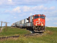 I haven't been out this way in a while, or out photographing at all. Life gets in the way. Well, I had the day off work and decided to take a drive to see what I could catch. Found CN 115 going south towards Calgary. 2538 was leading, with 2447 and 2152 trailing. Just north of Trochu Alberta. 