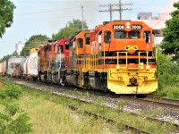 Goderich-Exeter Railway (GEXR) train 431 with QGRY GP38-2 2008, GEXR SD40-2 3394, RLK GP40 4095 and RLHH SD40-2 3403 is seen approaching the St. Leger Street crossing in Kitchener, Ontario on June 19, 2018.