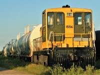 Waterloo Central Railway GE 70-Tonner 1556 waits between assignments in GEXR's Kitchener yard after completing it's tenure on the Waterloo Central. The owner of the tonner was moving the unit to OSR for short-term storage. Not too long after, 1556 moved to the Babcock-Wilcox Canada facility in Cambridge for contract switching duties. 