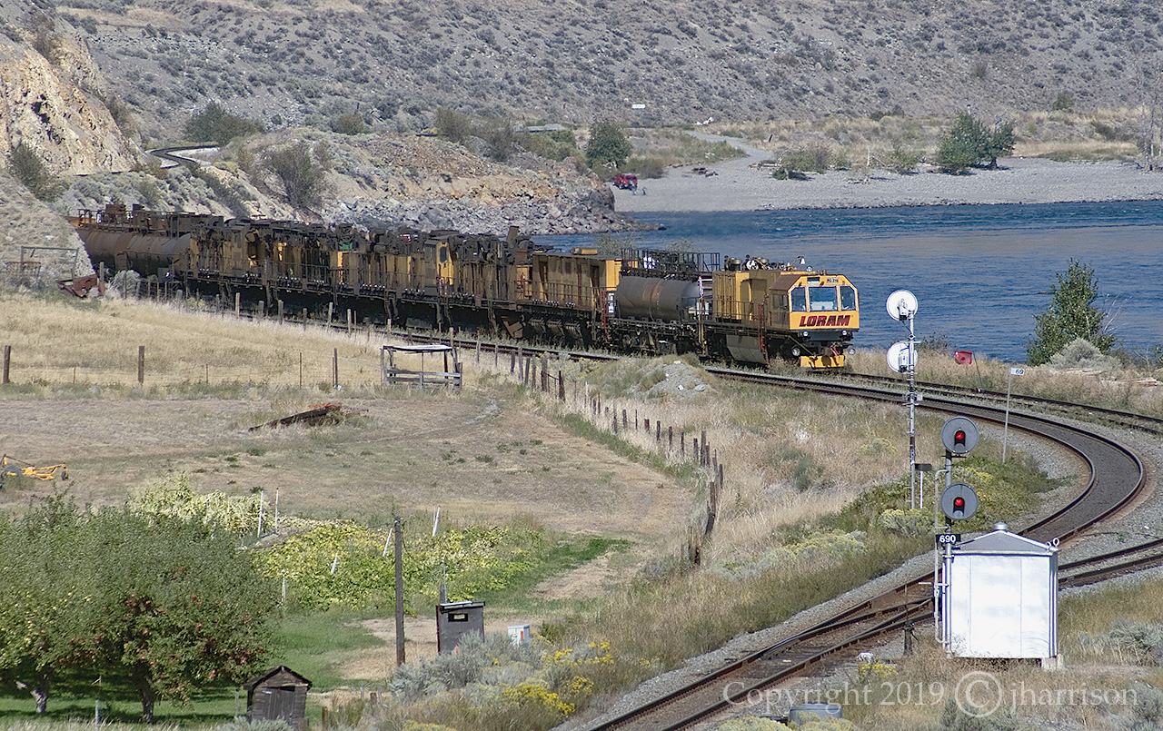 Loram RG316 is pointed west in the siding at Martel on CN's Ashcroft Sub. The town of Spences Bridge is just a few Km west of this location.