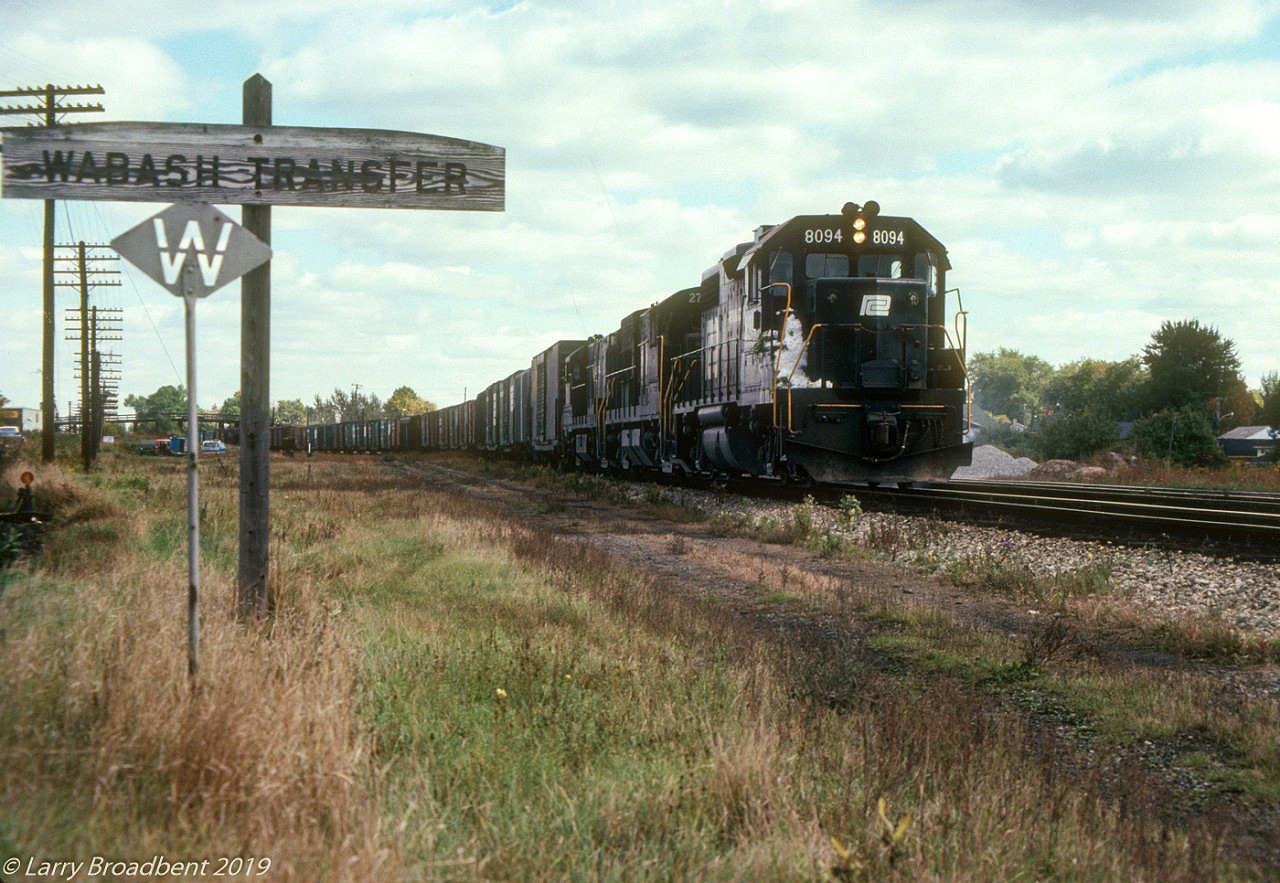 Westbound PC BM7 pulls into the St Thomas yard for a crew change October 1974, CPR credit Valley Railway is just to the photographers left. Whistle post is for the CPR Talbot Street crossing and the Wabash Transfer Mile Board used by the OSR today.
