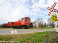 This OSR day started with <a href=http://www.railpictures.ca/?attachment_id=37410 target=_blank>a bang</a> with a pair of F units following a pair of pups, then <a href=http://www.railpictures.ca/?attachment_id=37388 target=_blank>chasing light power to St. Thomas</a> but the real action was after the OSR boys lifted cars to bring to Tillsonburg and Courtland.  Approaching the town of Tillsonburg I chose to frame this rural farm  between train related subjects and went really wide. I find it hard to believe that <a href=http://www.railpictures.ca/?attachment_id=38705 target=_blank>Larry Broadbent's capture in 1978</a> would have ran thru here at 60 MPH, but that and much more did until 1996. A mostly rural and mennonite area, reminders of OSR/CN's return to service still adorn the odd crossbuck. The first train was in November 2016 though.. and a certain someone linked in this caption was on that first train :)