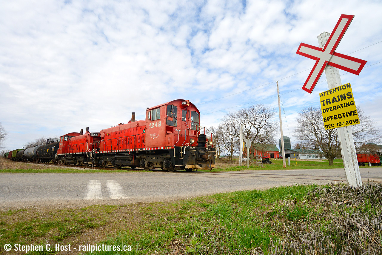 This OSR day started with a bang with a pair of F units following a pair of pups, then chasing light power to St. Thomas but the real action was after the OSR boys lifted cars to bring to Tillsonburg and Courtland.  Approaching the town of Tillsonburg I chose to frame this rural farm  between train related subjects and went really wide. I find it hard to believe that Larry Broadbent's capture in 1978 would have ran thru here at 60 MPH, but that and much more did until 1996. A mostly rural and mennonite area, reminders of OSR/CN's return to service still adorn the odd crossbuck. The first train was in November 2016 though.. and a certain someone linked in this caption was on that first train :)