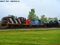 I was heading back to Sarnia after <a href=http://www.railpictures.ca/?attachment_id=37903 target=_blank> shooting 331 at Wyoming</a> and imagine my surprise as I ran into this working Procor. 331 was not that far away and I had one more shot planned, but THIS was much more interesting to me and I knew it would be a quick move.. so I made my choice. There's a saying about not going to Sarnia, but when you see this, I guess you're compelled to be going to Sarnia. :) 6420 is gone and I'm not sure where this GMD1 has ended up, but they ain't in Sarnia anymore.