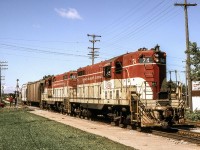 Peter Jobe photographed TH&B 74 and TH&B 73 switching in Smithville, Ontario at 1:40 P.M. on September 15, 1980.