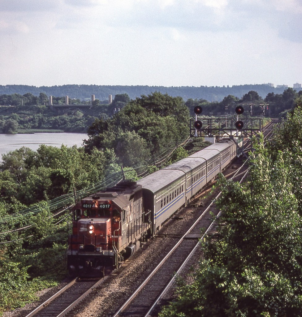 CN 4017 is leading a Toronto-bound VIA train through Bayview Junction on July 23, 1980. Notice the GO car on the back of 4017's train.