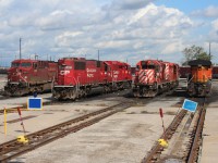 Motive power on the east end tracks today has AC4400 CP 8501 SD60 6225 with GP20eco 2319 behind. SD40-2 6018 has 5978 behind it and BNSF 4290 an ES44C4.
