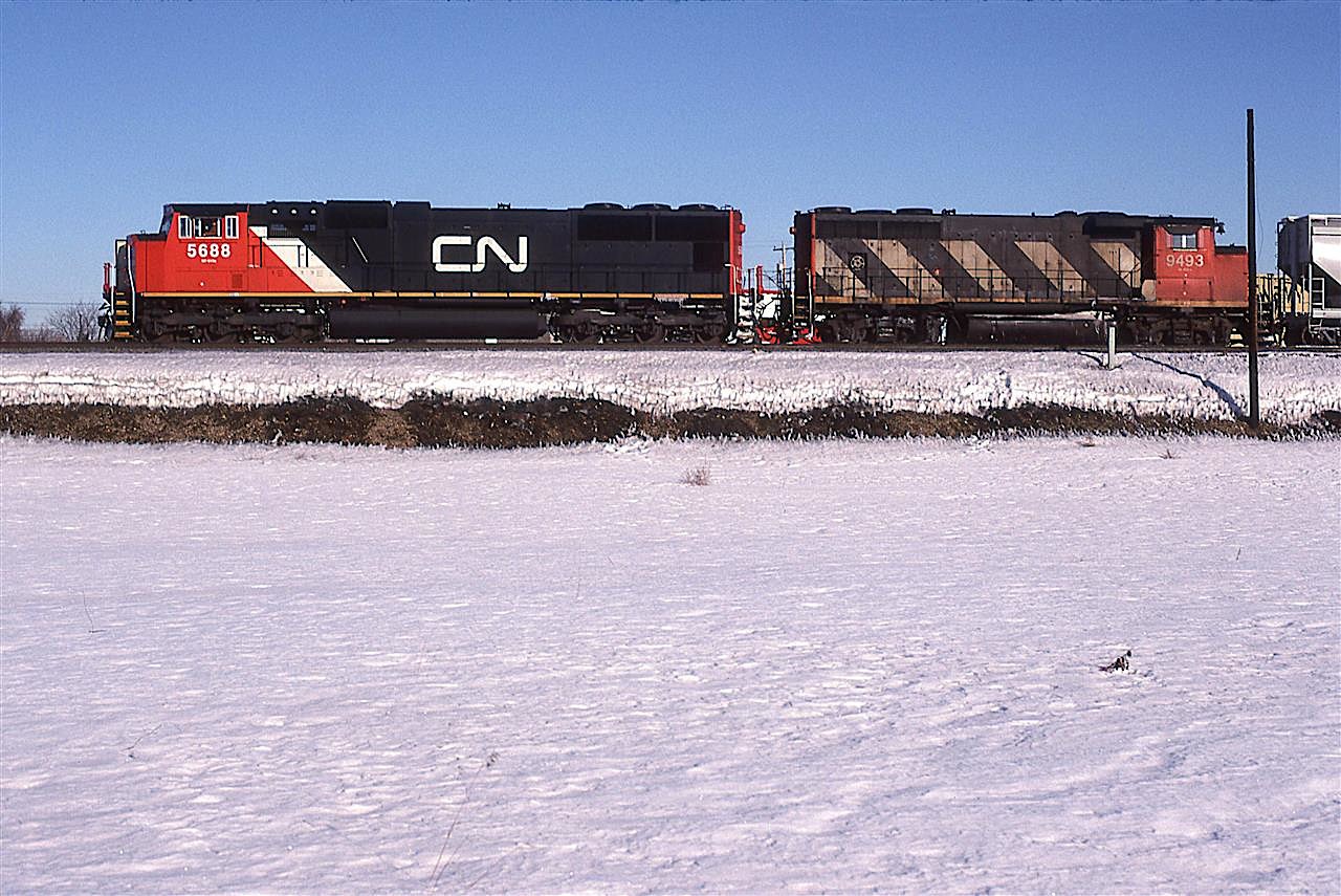 The SD75I's were being delivered in droves about this time. Here, one is leading 219, the Toronto to Edmonton hot-ish train dominated by chemicals. They already made a set out in Clover Bar Yard, and are continuing to Walker Yard with the remaining cars.
