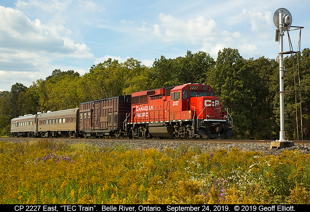 CP Track Geometry Train, with CP 2227 on point, sits at the east end of Belle River Siding waiting on the Conductor to throw the switch so that they can proceed east on September 24, 2019.