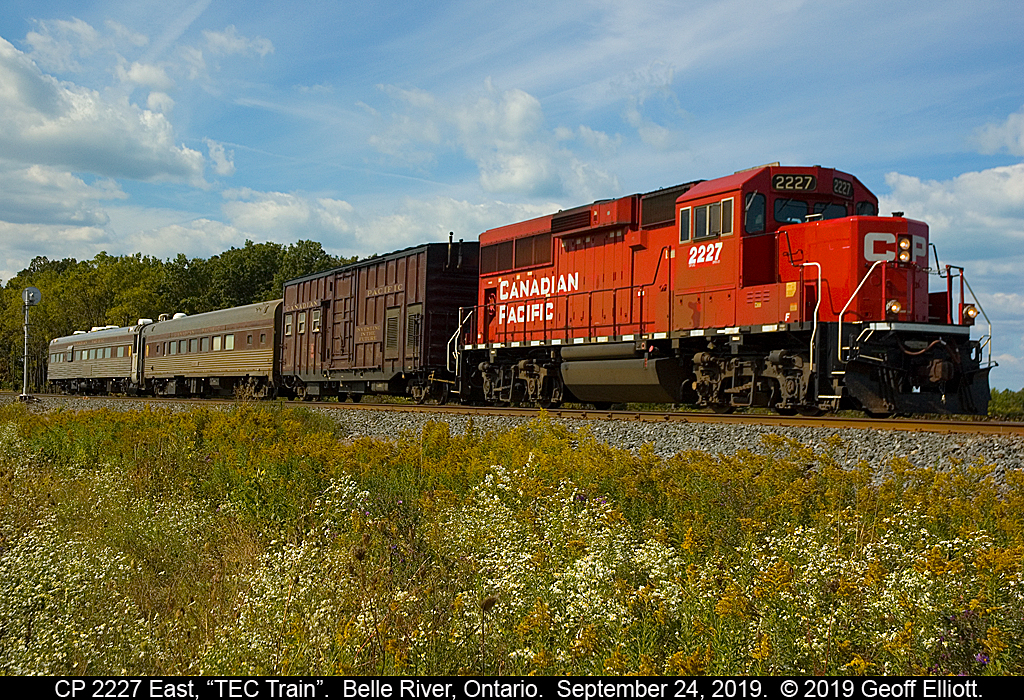 CP Track Geometry Train, with CP 2227 on point, departs the east end of Belle River Siding and proceeds east on on the Windsor Subdivision on September 24, 2019.