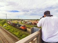 A Battle Won!<br><br>

Engineer Brian Murray is in control of train 305, as they put their train together at Gordon Yard in Moncton, New Brunswick. This is no ordinary trip for Murray. This is the first mainline trip he's done in about 9 months after battling cancer. I'm happy to say he won the battle and is now cancer free. It's a battle, but cancer doesn't always win! Here's hoping for plenty more great years Brian! 