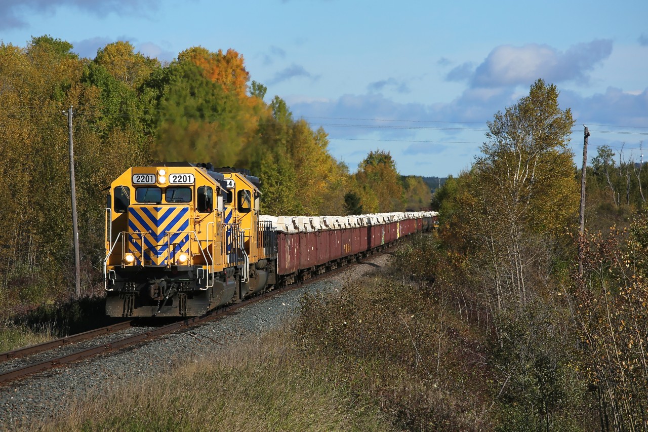 With both units in the new "Arrow" paint scheme, 2201 and 1734 lead train 207 through Porquis Junction towards Kidd Yard.