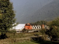 CN 5095 and 5064, two GMD SD40's, are westbound at Cheam View on CN's Yale Sub.