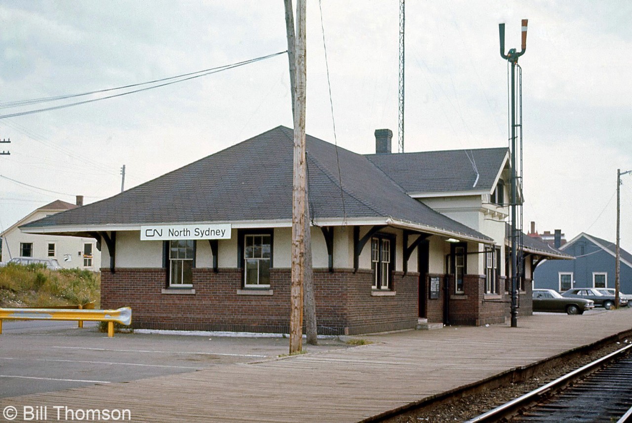 A platform view of CN's North Sydney station is pictured in July 1971, located at Mile 98.8 of CN's Sydney Subdivision. This CN (later VIA) station is presently boarded up but still exists, apparently owned by the Cape Breton & Central Nova Scotia Railway (who purchased the line from CN in 1993).