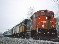CN 2508 on what appears to be a rescue mission as it leads VIA #1 westward through the tail end of an ice storm at Rosedale on CN's Yale sub. The VIA units were #6454 and 6452. 