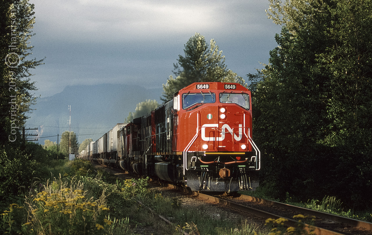 CN 5649 - A GMD SD75I built in '96, and taken here in September of '96 rolling west through Rosedale on CN's Yale Sub.