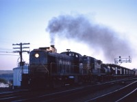 Veteran RS2 8406 leads an eastbound CP freight through Bayview at dusk...The 8406 was one of four MLW built RS2s on the CP roster, originally built in November 1950 as part of the program for dieselization of the Schreiber Division in northern Ontario. She survived the trade-ins for C424s in the mid-1960s but suffered an electrical fire in 1969 and was scrapped at Angus shops in 1970 (source: Canadian Pacific Diesel Power book by Murray Dean and David Hanna).