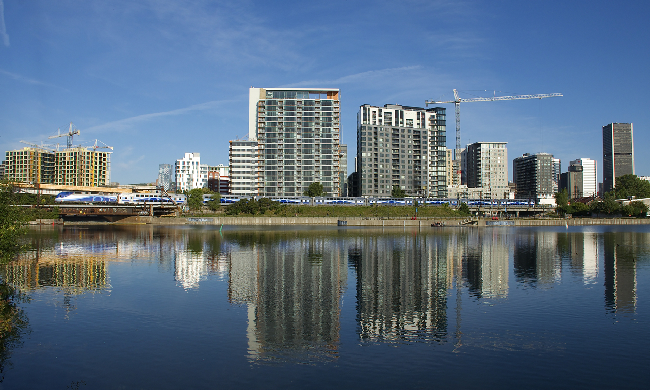 EXO 807 is reflected in the Peel Basin on a sunny morning.