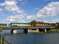VIA 62 with VIA 901 leading is meeting CN X321 with CN 2408 & CN 8943 for power over the Lachine Canal.