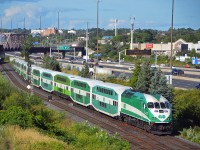 GO Transit train 9209 has just departed the station in Pickering as it heads west from Oshawa ON to Toronto (Union Station).  Traveling down Canadian National's GO Subdivision the train is about to duck under CN's York Sub (which heads to MacMillan Yard).  This location on the GO Sub is called Bayly.  (Pickering, Ontario - August 25, 2019)