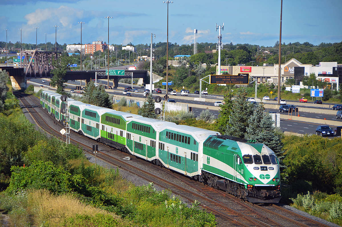 GO Transit train 9209 has just departed the station in Pickering as it heads west from Oshawa ON to Toronto (Union Station).  Traveling down Canadian National's GO Subdivision the train is about to duck under CN's York Sub (which heads to MacMillan Yard).  This location on the GO Sub is called Bayly.  (Pickering, Ontario - August 25, 2019)