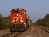 With a 0830 departure time, the Hearst to Sault Ste Marie passenger train has just left the "station" at Hearst.  It is seen backing up towards Hearst Junction where it will take the west leg of the wye and continue on southwards towards the Soo.