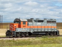 After <a href="http://www.railpictures.ca/?attachment_id=38722" target="_blank">chasing the GWR to Verwood</a> I went down towards Coronach to see if the Poplar River Mine Railway was running. They were not unfortunately, though I was able to see the "new" unit GWR had left on them at the "interchange" (if you can call it that) near Coronach. This unit had formerly been <a href="http://www.railpictures.ca/?attachment_id=20052" target="_blank">at an elevator in Unity, Saskatchewan</a>, but seemingly is going to replace or supplement one of the two SD40-2s on the Poplar River currently. Other RP contributors have shot the Poplar River in the past, such as <a href="http://www.railpictures.ca/?attachment_id=35609" target="_blank">Bill Hopper</a>. It is an interesting and mostly captive operation, with them shuttling a small string of coal hoppers back and forth from the mine to the power plant, a distance of about a dozen miles with a relatively small loop track at both ends. Not much ever comes in or out of this operation from what I gather. <br><br>Somewhat noteworthy as well was the number of the new K+S potash hoppers in storage nearby and throughout the GWR network overall. These hoppers had just recently rolled off the line at NSC in Hamilton.