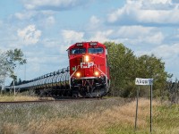 CP 583 (unit oil empties), with the 8150 solo, takes the bend coming out of Asquith, Saskatchewan as it continues its journey back to Alberta. 