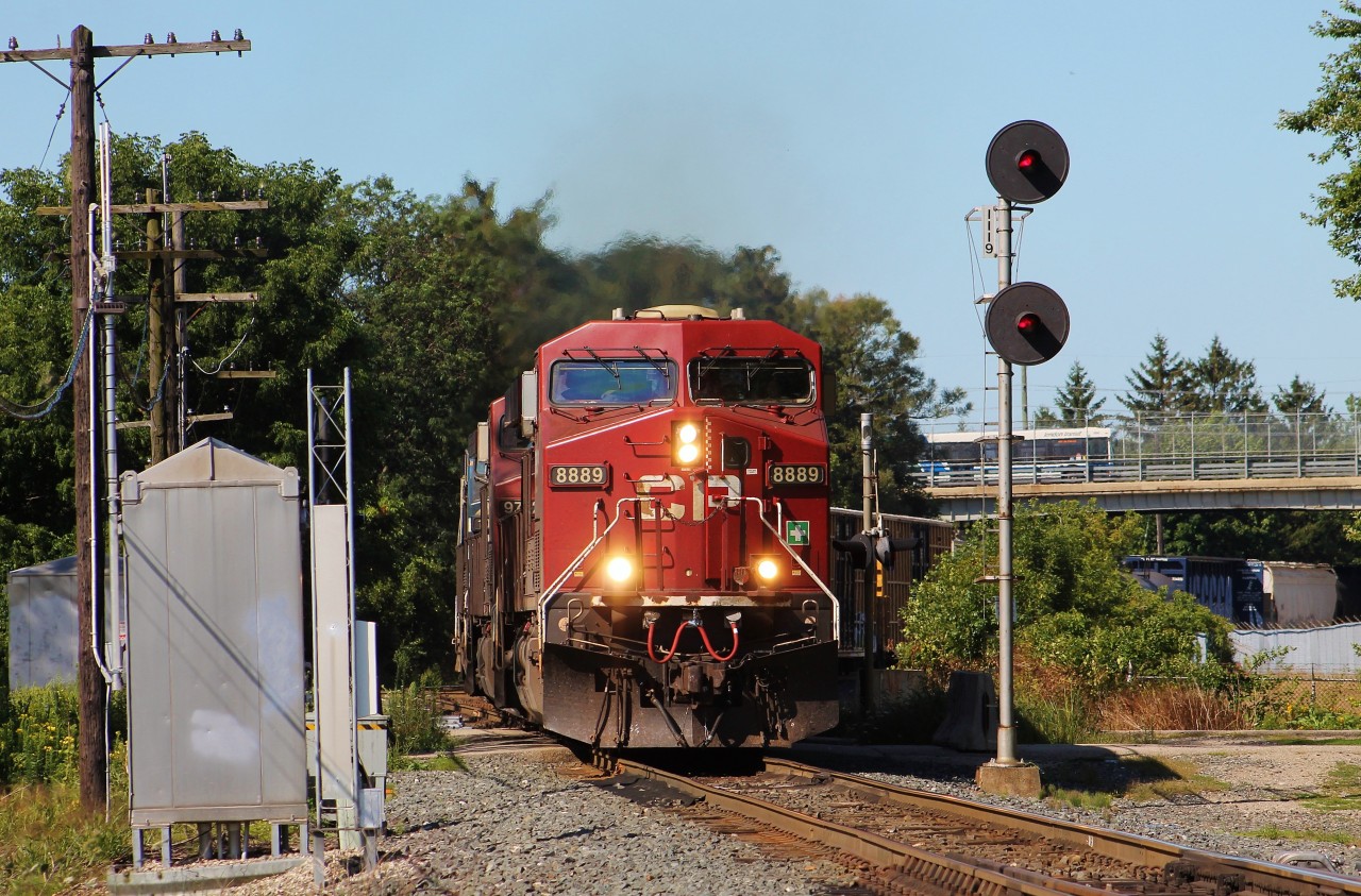 After completing their crew change and waiting for 235 to clear up, CP 140 departs from the east end of Quebec Street Yard in London, ON.